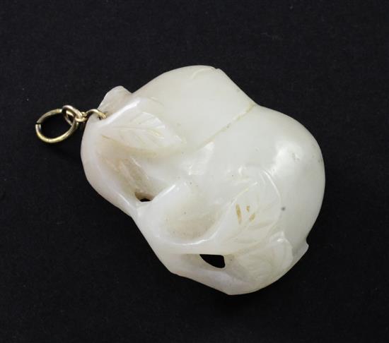 A Chinese whiteish grey jade carving of a peach branch sprig, 19th century, 4.2cm